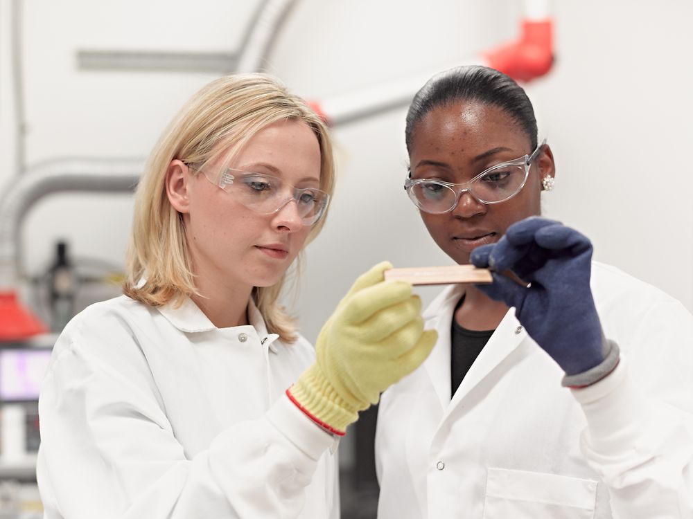 Two women in laboratory.