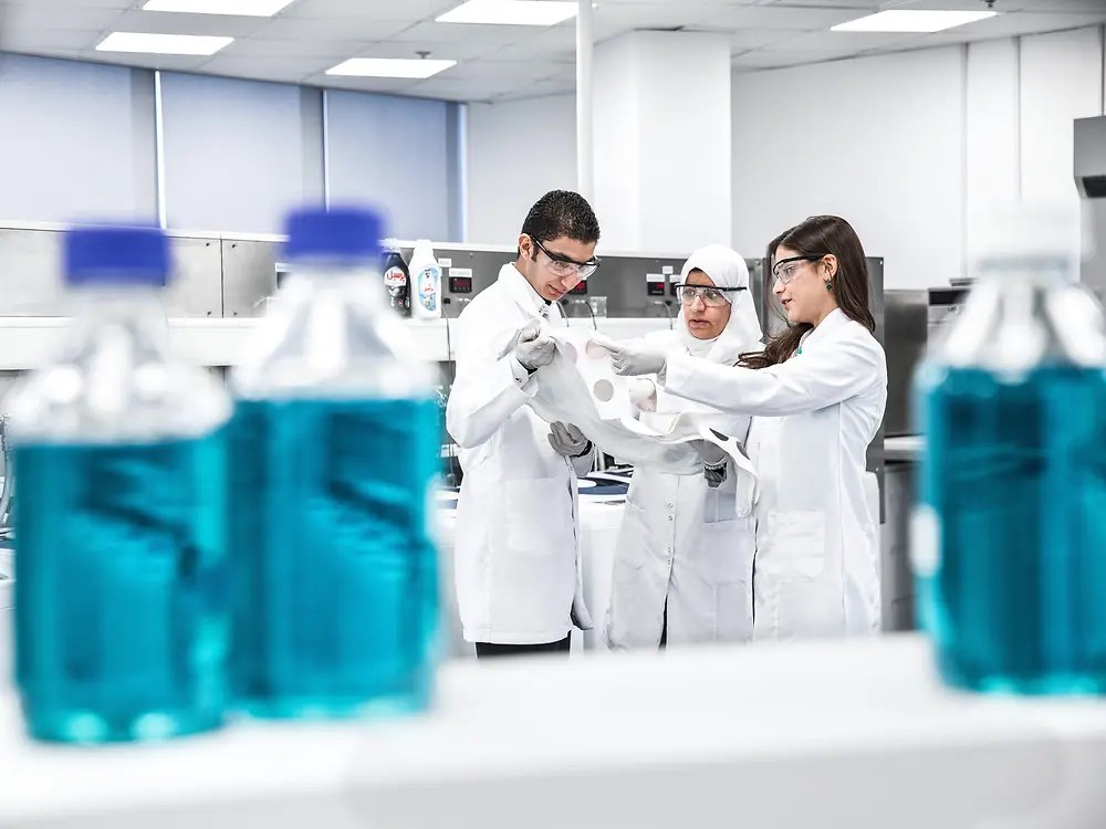 Three researchers in the Innovation Center in Dubai.